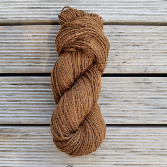 Walnut husks and pomegranate 8ply  Corriedale